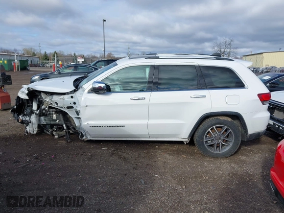 2021 Jeep Grand Cherokee Limited z VIN 1C4RJFBG7MC512716, wystawiony jako IAAI lot #41880103 z przebiegiem 66 739 mil mil oraz . Historia ofert i sprzedaży dostępna na DreamBid. Obrazek 14.