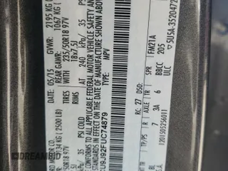 2015 Ford Escape Titanium with VIN 1FMCU9J92FUC74879, listed as a Copart auction lot 54683185 with 143,436 mi miles and Salvage title. Bid and sale history available at DreamBid. Image 13.