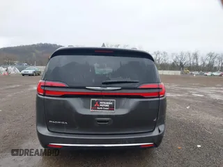 2021 Chrysler Pacifica Touring L with VIN 2C4RC1BG7MR584956, listed as a IAAI auction lot 42016887 with 51,415 mi miles and . Bid and sale history available at DreamBid. Image 17.