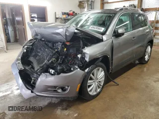 2010 Volkswagen Tiguan with VIN WVGBV9AX1AW510300, listed as a Copart auction lot 49428965 with 63,871 mi miles and Salvage title. Bid and sale history available at DreamBid. Image 1.