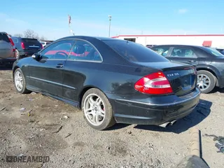 2004 Mercedes-Benz CLK-Class AMG with VIN WDBTJ76H24F113952, listed as a IAAI auction lot 41690890 with 109,766 mi miles. Bid and sale history available at carsss.com. Image 3.