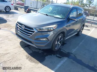 2017 Hyundai Tucson Value with VIN KM8J33A25HU402366, listed as a IAAI auction lot 41814426 with 117,669 mi miles. Bid and sale history available at carsss.com. Image 17.
