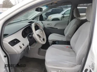 2012 Toyota Sienna LE AAS with VIN 5TDKK3DC1CS224663, listed as a Copart auction lot 47818225 with 214,883 mi miles and Clean Title. Bid and sale history available at carsss.com. Image 7.