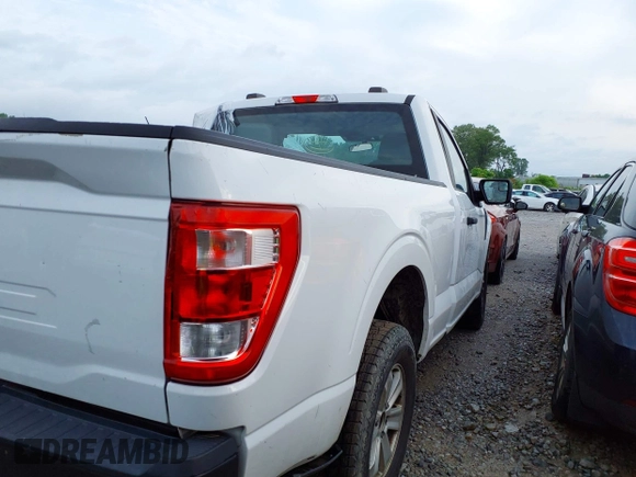 2021 Ford F-150 XL with VIN 1FTMF1CB5MKE25341, listed as a IAAI auction lot 42103478 with 125,369 mi miles and . Bid and sale history available at DreamBid. Image 4.