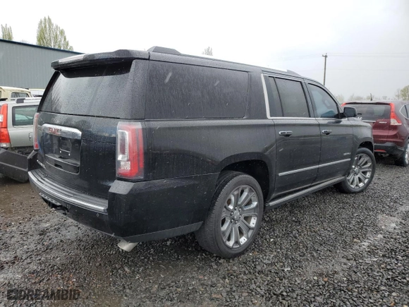 2015 GMC Yukon XL Denali with VIN 1GKS2JKJ6FR592902, listed as a Copart auction lot 52459495 with 226,748 mi miles and Clean Title. Bid and sale history available at carsss.com. Image 3.