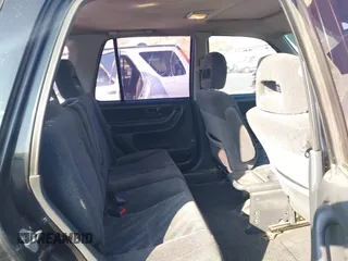 1999 Honda CR-V LX with VIN JHLRD284XXC018161, listed as a IAAI auction lot 41421514 with 209,066 mi miles. Bid and sale history available at carsss.com. Image 8.