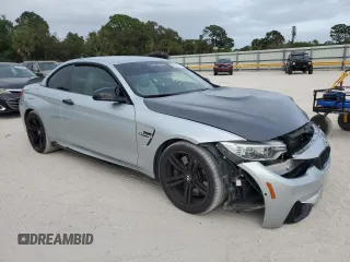 2016 BMW M4 with VIN WBS3U9C52GP969466, listed as a Copart auction lot 39457474 with 56,022 mi miles. Bid and sale history available at carsss.com. Image 4.