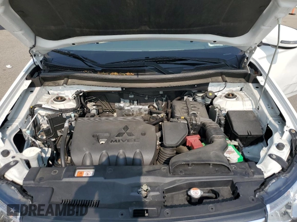 2014 Mitsubishi Outlander SE z VIN JA4AZ3A39EZ016327, wystawiony jako Copart lot #59977075 z przebiegiem 77 214 mil mil oraz Szkoda całkowita • Salvage title. Historia ofert i sprzedaży dostępna na DreamBid. Obrazek 12.