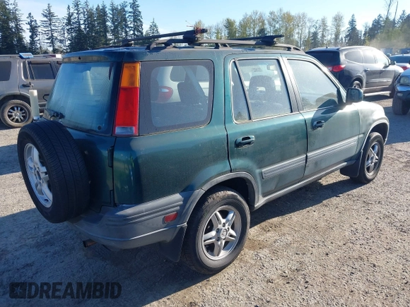 2001 Honda CR-V EX with VIN JHLRD18661C000677, listed as a IAAI auction lot 42020034 with 133,192 mi miles. Bid and sale history available at carsss.com. Image 4.