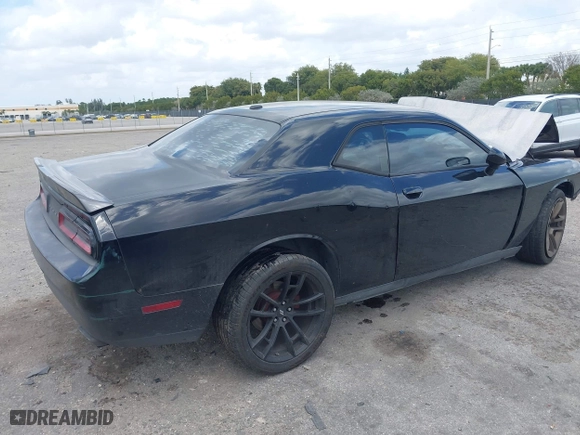 2013 Dodge Challenger SXT with VIN 2C3CDYAG2DH511985, listed as a IAAI auction lot 41917707 with 111,872 mi miles. Bid and sale history available at carsss.com. Image 4.