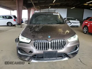 2020 BMW X1 xDrive28i with VIN WBXJG9C05L5R40935, listed as a Copart auction lot 47145335 with 46,554 mi miles and Salvage Title. Bid and sale history available at carsss.com. Image 5.