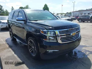 2017 Chevrolet Tahoe Premier z VIN 1GNSCCKC9HR229204, wystawiony jako IAAI lot #42066553 z przebiegiem 138 561 mil mil oraz . Historia ofert i sprzedaży dostępna na DreamBid. Obrazek 1.