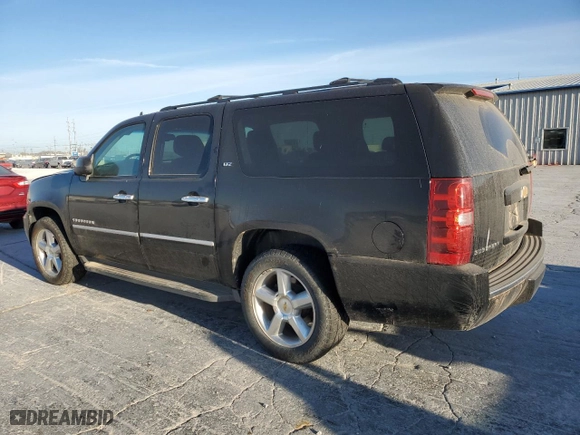 2012 Chevrolet Suburban LTZ with VIN 1GNSKKE71CR310010, listed as a Copart auction lot 48943445 with 311,512 mi miles and Clean Title. Bid and sale history available at carsss.com. Image 2.