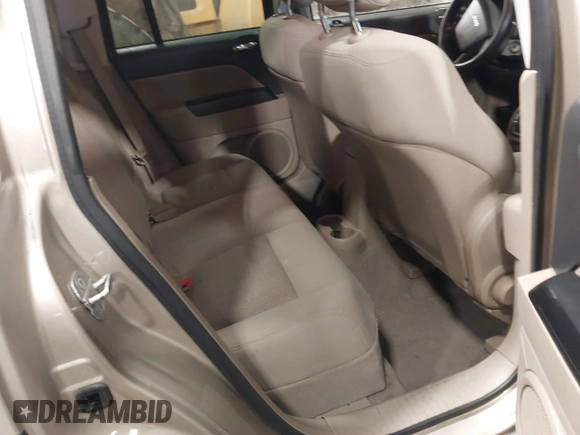 2010 Jeep Compass Sport with VIN 1J4NF4FB7AD501587, listed as a IAAI auction lot 41514419 with 154,826 mi miles. Bid and sale history available at carsss.com. Image 8.
