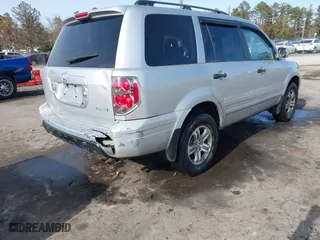 2004 Honda Pilot EX with VIN 2HKYF18634H515163, listed as a IAAI auction lot 40786017 with 206,036 mi miles. Bid and sale history available at carsss.com. Image 4.