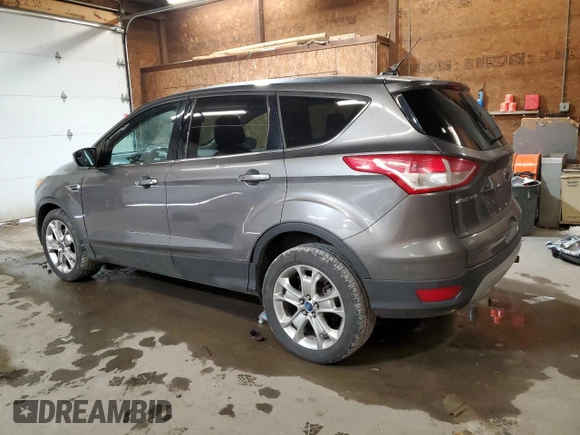 2013 Ford Escape SEL with VIN 1FMCU9HX5DUB97779, listed as a Copart auction lot 52407545 with 145,302 mi miles and Salvage Title. Bid and sale history available at carsss.com. Image 2.