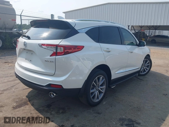 2021 Acura RDX Technology with VIN 5J8TC1H58ML009948, listed as a IAAI auction lot 42402678 with 113,463 mi miles and . Bid and sale history available at DreamBid. Image 4.