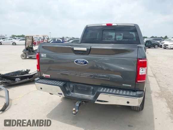 2018 Ford F-150 XL with VIN 1FTEW1EGXJKD18696, listed as a IAAI auction lot 42128458 with 80,811 mi miles and . Bid and sale history available at DreamBid. Image 17.