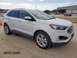 2020 Ford Edge SEL с VIN 2FMPK3J93LBB16928, выставлен на аукционе Copart как лот 63030385 с пробегом 81 567 миль миль и Чистый • Clean title. История ставок и продаж доступна на DreamBid. Изображение 4.