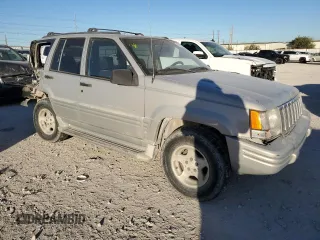 1998 Jeep Grand Cherokee with VIN 1J4FX48S4WC345469, listed as a Copart auction lot 80721224 with 201,543 mi miles and Salvage title. Bid and sale history available at DreamBid. Image 4.
