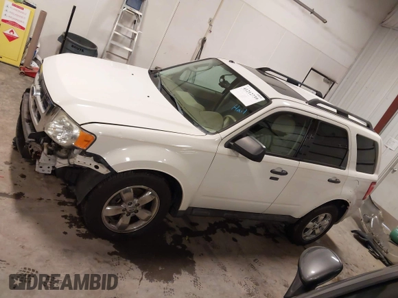 2012 Ford Escape XLT z VIN 1FMCU9DG4CKA72675, wystawiony jako IAAI lot #41212739 z przebiegiem 112 781 mil mil oraz . Historia ofert i sprzedaży dostępna na DreamBid. Obrazek 15.