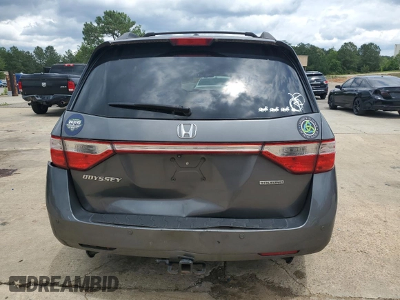 2012 Honda Odyssey Touring with VIN 5FNRL5H90CB050580, listed as a Copart auction lot 58502925 with 226,929 mi miles and Salvage title. Bid and sale history available at DreamBid. Image 6.