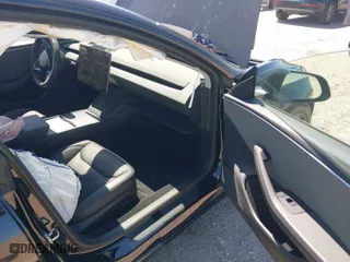 2024 Tesla Model 3 with VIN 5YJ3E1EA4RF745385, listed as a IAAI auction lot 41772450 with 11,856 mi miles. Bid and sale history available at carsss.com. Image 5.