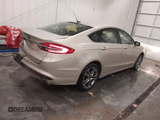 2017 Ford Fusion SE with VIN 3FA6P0HD1HR275097, listed as a IAAI auction lot 41791961 with 136,887 mi miles. Bid and sale history available at carsss.com. Image 4.