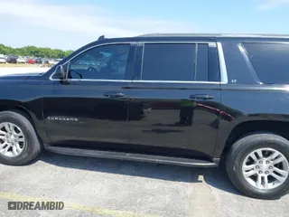 2018 Chevrolet Suburban LT with VIN 1GNSCHKC7JR111560, listed as a IAAI auction lot 41823175 with 136,751 mi miles. Bid and sale history available at carsss.com. Image 14.