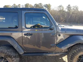 2021 Jeep Wrangler Sport S with VIN 1C4GJXAGXMW863259, listed as a IAAI auction lot 41399671 with 41,270 mi miles and . Bid and sale history available at DreamBid. Image 13.