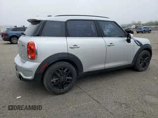 2015 MINI Countryman S z VIN WMWZC3C58FWT06471, wystawiony jako Copart lot #57570585 z przebiegiem 101 963 mil mil oraz Tytuł czysty. Historia ofert i sprzedaży dostępna na DreamBid. Obrazek 3.