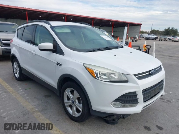 2015 Ford Escape SE with VIN 1FMCU0GX2FUB33893, listed as a IAAI auction lot 41455605 with 128,383 mi miles. Bid and sale history available at carsss.com. Image 1.