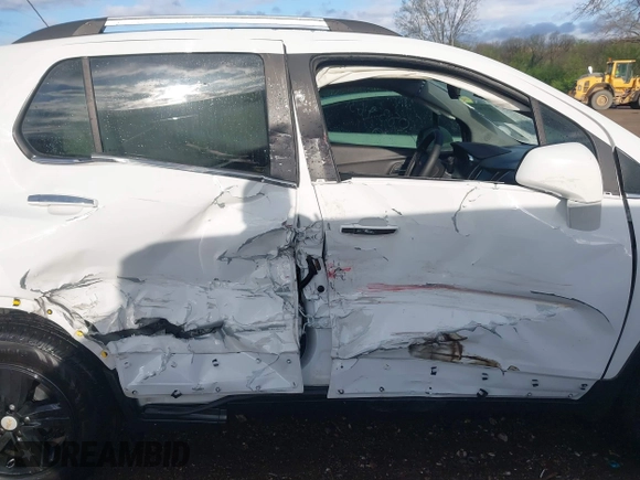 2020 Chevrolet Trax LT with VIN KL7CJLSB0LB083963, listed as a IAAI auction lot 42073793 with 62,925 mi miles and . Bid and sale history available at DreamBid. Image 12.