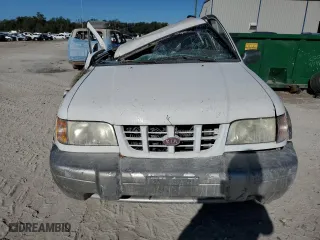 1998 Kia Sportage with VIN KNDJB7232W5569054, listed as a Copart auction lot 82756824 with 106,550 mi miles and Salvage Title. Bid and sale history available at carsss.com. Image 5.
