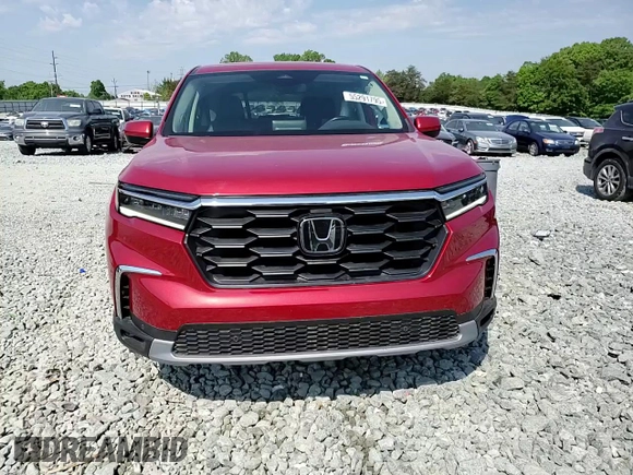 2023 Honda Pilot EX-L with VIN 5FNYG2H40PB003512, listed as a Copart auction lot 55291795 with 17,493 mi miles and Salvage title. Bid and sale history available at DreamBid. Image 14.