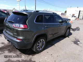 2019 Jeep Cherokee Latitude Plus with VIN 1C4PJLLX7KD129077, listed as a IAAI auction lot 39021322 with 69,503 mi miles. Bid and sale history available at carsss.com. Image 4.