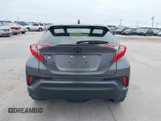 2021 Toyota C-HR LE with VIN JTNKHMBX3M1120177, listed as a IAAI auction lot 41257866 with 43,964 mi miles. Bid and sale history available at carsss.com. Image 16.