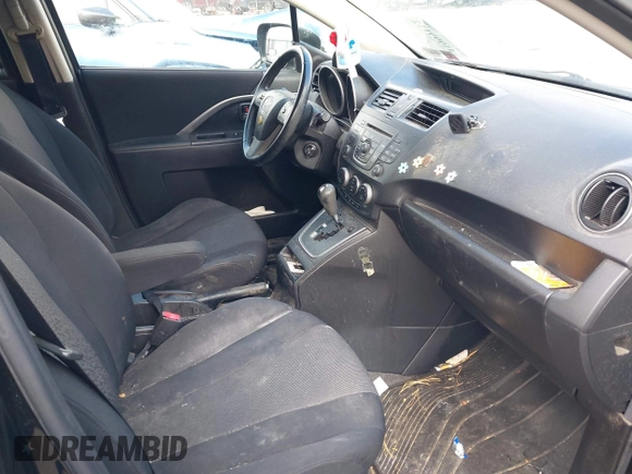 2012 Mazda 5 Touring with VIN JM1CW2CL8C0111574, listed as a IAAI auction lot 41999112 with 126,963 mi miles and . Bid and sale history available at DreamBid. Image 5.
