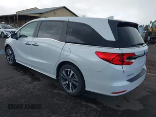 2022 Honda Odyssey Touring with VIN 5FNRL6H8XNB057293, listed as a IAAI auction lot 41826014 with 30,454 mi miles and . Bid and sale history available at DreamBid. Image 3.