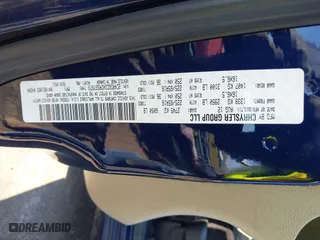 2013 Dodge Grand Caravan SXT with VIN 2C4RDGCGXDR527973, listed as a IAAI auction lot 41930036 with 111,985 mi miles. Bid and sale history available at carsss.com. Image 9.