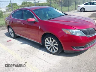 2015 Lincoln MKS z VIN 1LNHL9DK9FG603406, wystawiony jako IAAI lot #42540152 z przebiegiem Nie podano mil oraz . Historia ofert i sprzedaży dostępna na DreamBid. Obrazek 1.