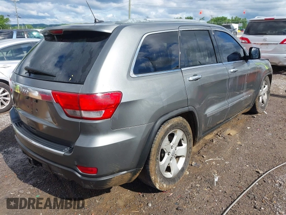 2011 Jeep Grand Cherokee Overland Summit with VIN 1J4RR6GT3BC713812, listed as a IAAI auction lot 42398585 with 208,476 mi miles and . Bid and sale history available at DreamBid. Image 4.