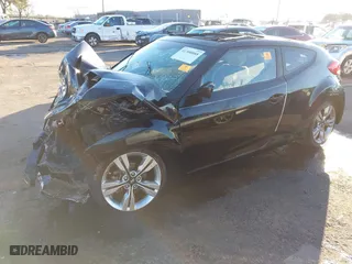 2014 Hyundai Veloster with VIN KMHTC6AD3EU184600, listed as a IAAI auction lot 41300088 with 1 mi miles. Bid and sale history available at carsss.com. Image 17.