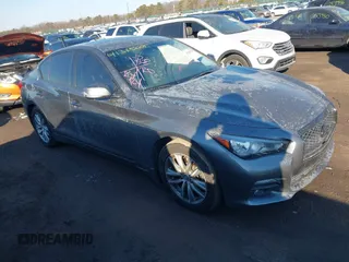 2015 Infiniti Q50 Premium z VIN JN1BV7AR2FM423666, wystawiony jako IAAI lot #41345228 z przebiegiem 67 027 mil mil oraz . Historia ofert i sprzedaży dostępna na DreamBid. Obrazek 1.