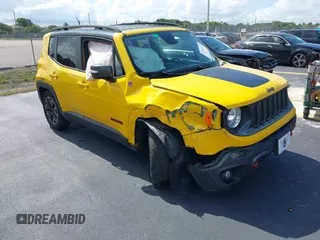 2017 Jeep Renegade Deserthawk z VIN ZACCJBCB3HPF81874, wystawiony jako IAAI lot #42190315 z przebiegiem 51 694 mil mil oraz . Historia ofert i sprzedaży dostępna na DreamBid. Obrazek 1.