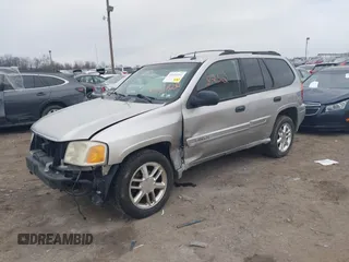 2004 GMC Envoy SLE with VIN 1GKDT13SX42135951, listed as a IAAI auction lot 41668252 with 216,193 mi miles. Bid and sale history available at carsss.com. Image 2.