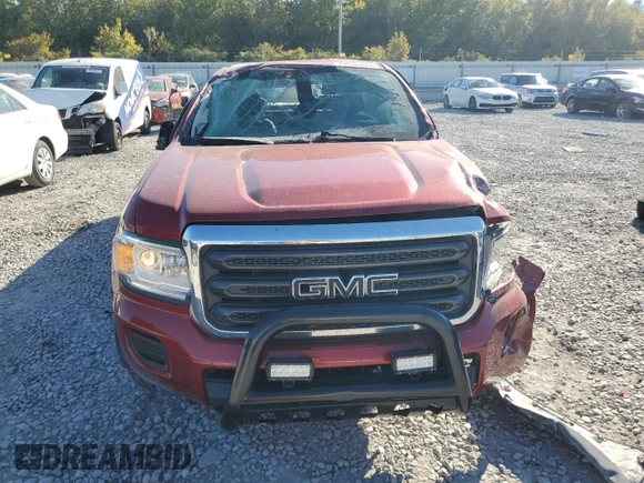 2015 GMC Canyon 2WD with VIN 1GTH5AE30F1182024, listed as a Copart auction lot 77032494 with 55,845 mi miles and Salvage Title. Bid and sale history available at carsss.com. Image 5.