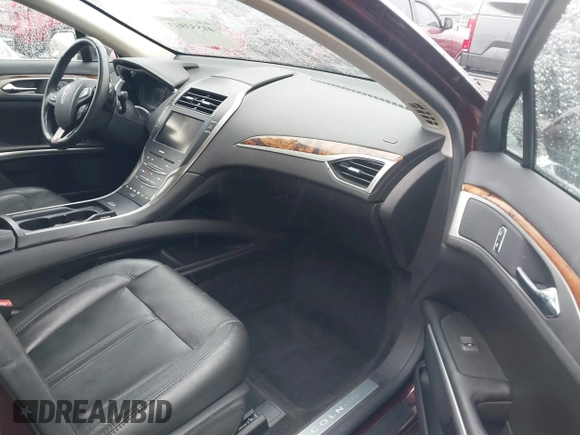 2013 Lincoln MKZ z VIN 3LN6L2G96DR825348, wystawiony jako IAAI lot #41553933 z przebiegiem 43 529 mil mil oraz . Historia ofert i sprzedaży dostępna na DreamBid. Obrazek 5.