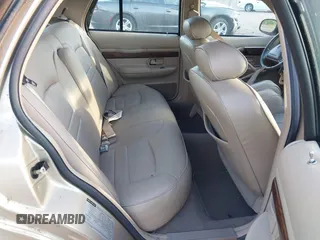 1999 Mercury Grand Marquis LS z VIN 2MEFM75W1XX703878, wystawiony jako IAAI lot #42074187 z przebiegiem 56 962 mil mil oraz . Historia ofert i sprzedaży dostępna na DreamBid. Obrazek 8.