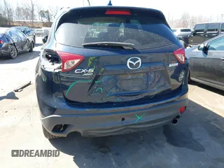 2016 Mazda CX-5 Touring with VIN JM3KE4CY0G0631786, listed as a IAAI auction lot 41761214 with 220,058 mi miles. Bid and sale history available at carsss.com. Image 17.